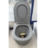 Wall hung toilet light grey